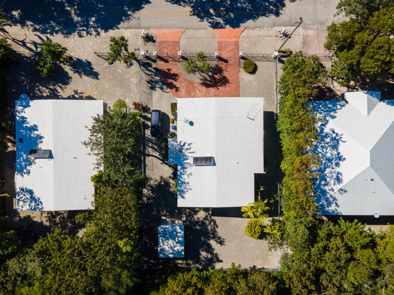 205 Sunset Boulevard Key Largo, FL 33037 - Photo 33 of 42 an aerial view of a house with a yard and garden