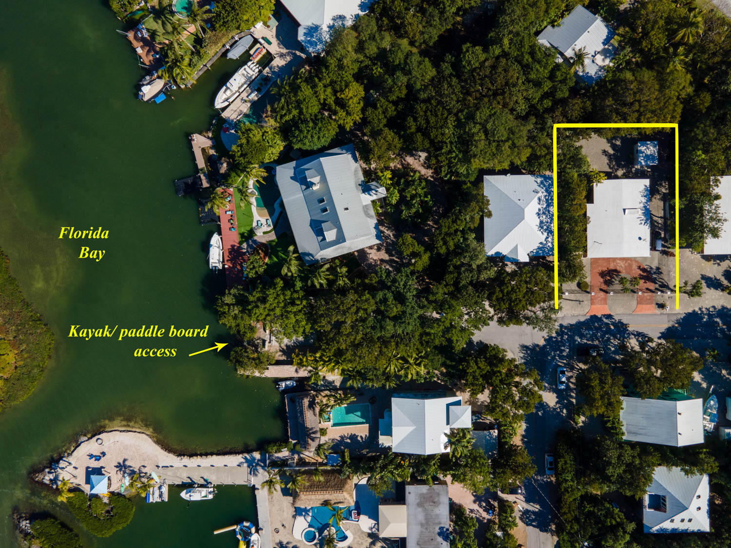 205 Sunset Boulevard Key Largo, FL 33037 - Photo 5 of 42 an aerial view of a house with swimming pool outdoor seating and yard