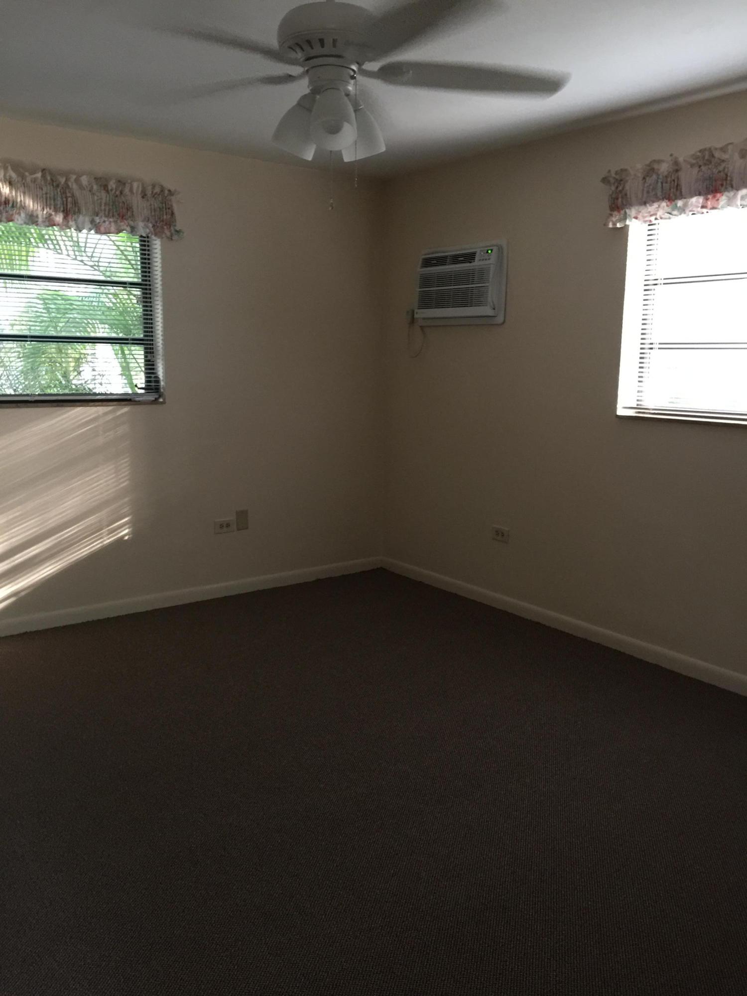 205 Sunset Boulevard Key Largo, FL 33037 - Photo 41 of 42 an empty room with a window