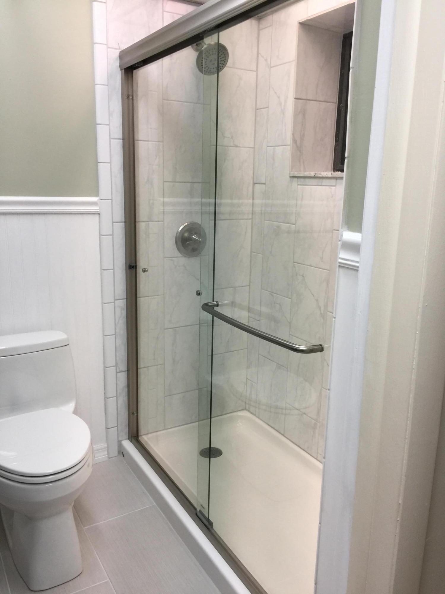 205 Sunset Boulevard Key Largo, FL 33037 - Photo 42 of 42 a bathroom with a toilet and a shower