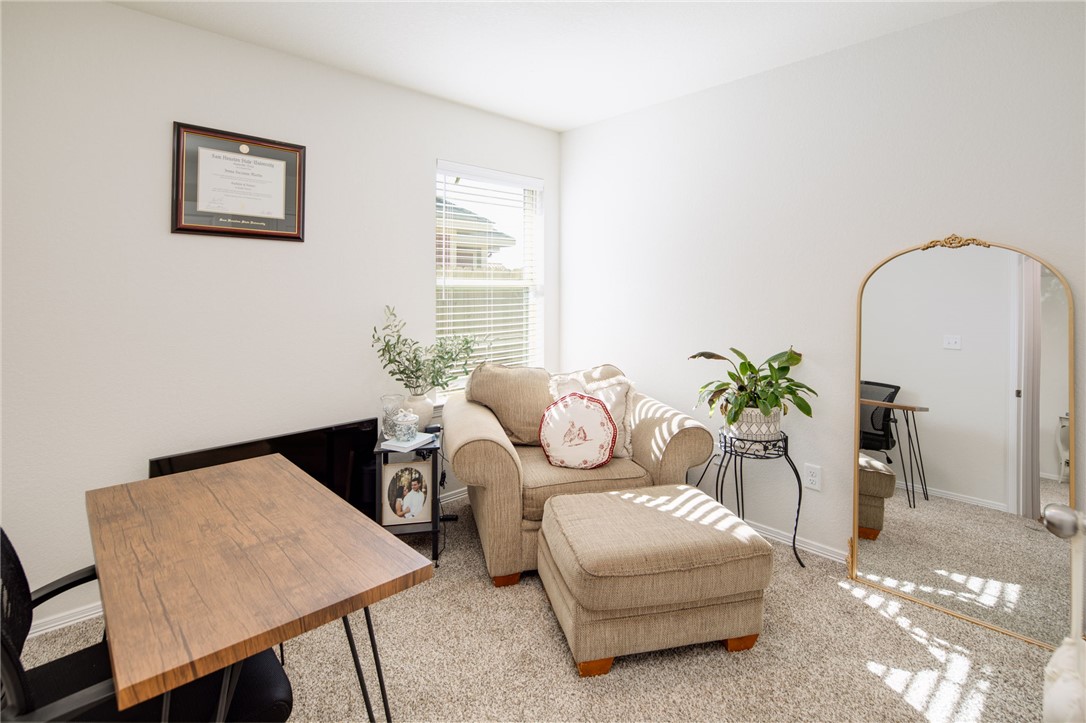 2799 Messenger Way Bryan, TX 77803 - Photo 12 of 15 a living room with furniture flowerpot and window
