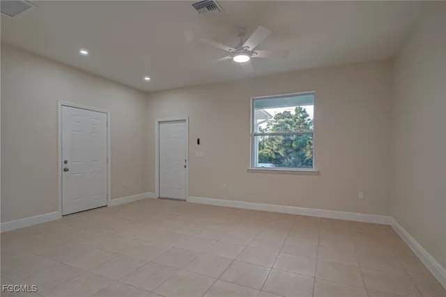 an empty room with windows