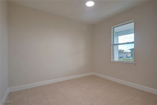 an empty room with a window