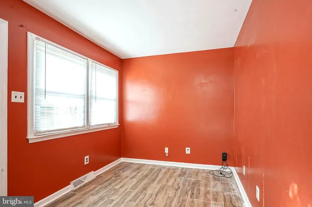 an empty room with a window