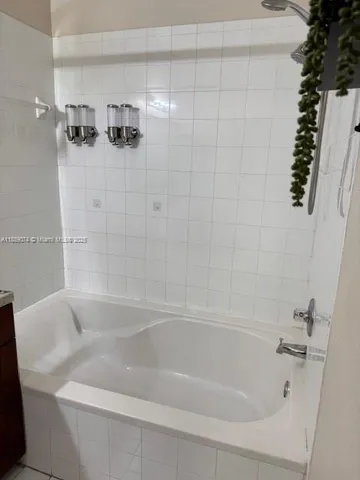 a bathroom with a sink a toilet and vanity