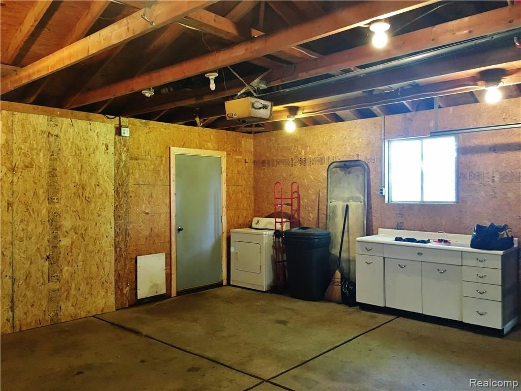 29015 Armada Ridge Road Richmond, MI 48062 - Photo 49 of 50 Garage door to back yard with doggie door too