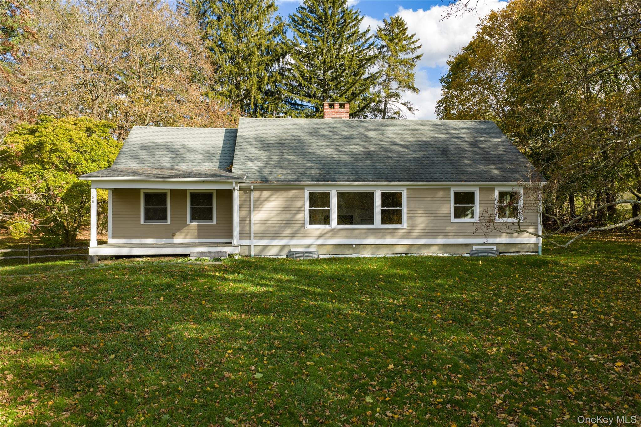 156 Sharon Station Road Amenia, NY 12501 - Photo 16 of 17 a front view of house with yard and green space