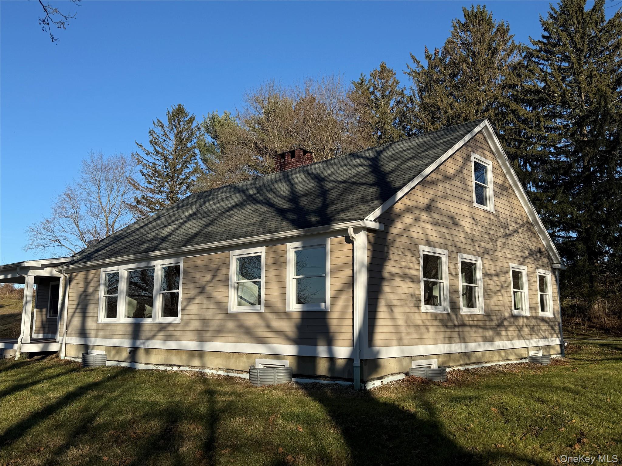 156 Sharon Station Road Amenia, NY 12501 - Photo 17 of 17 a front view of a house with a yard