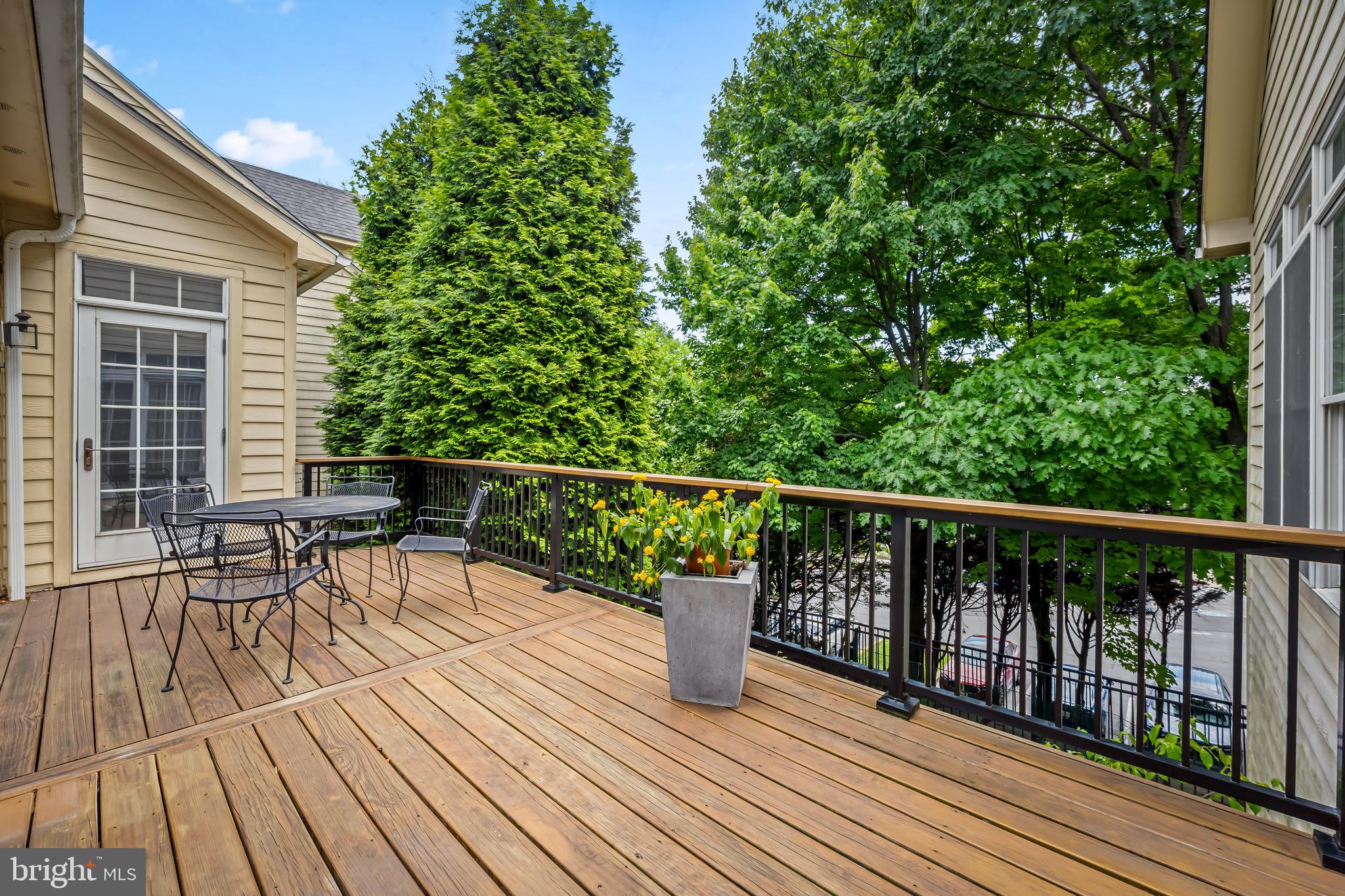 24 Roland Green, Unit 12 Baltimore, MD 21210 - Photo 44 of 53 a view of balcony with furniture and wooden floor