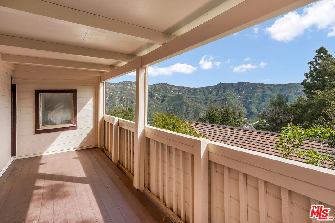 2015 Corral Canyon Road Malibu, CA 90265 - Photo 11 of 24 a view of a two chair in balcony