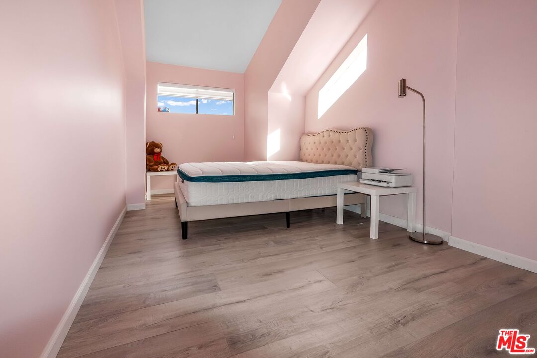 2015 Corral Canyon Road Malibu, CA 90265 - Photo 16 of 24 a view of a room with wooden floor and window