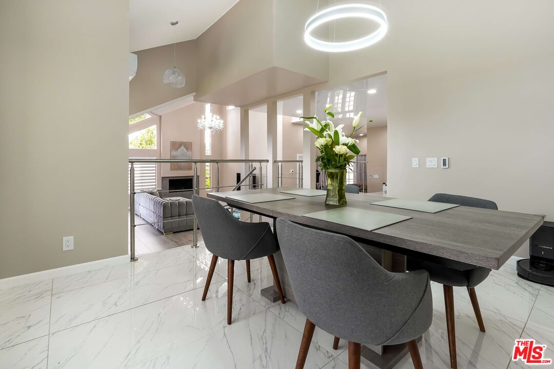 2015 Corral Canyon Road Malibu, CA 90265 - Photo 4 of 24 a dining room with furniture and window