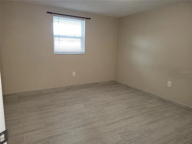 an empty room with a window