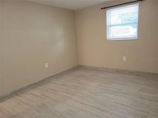 an empty room with a window