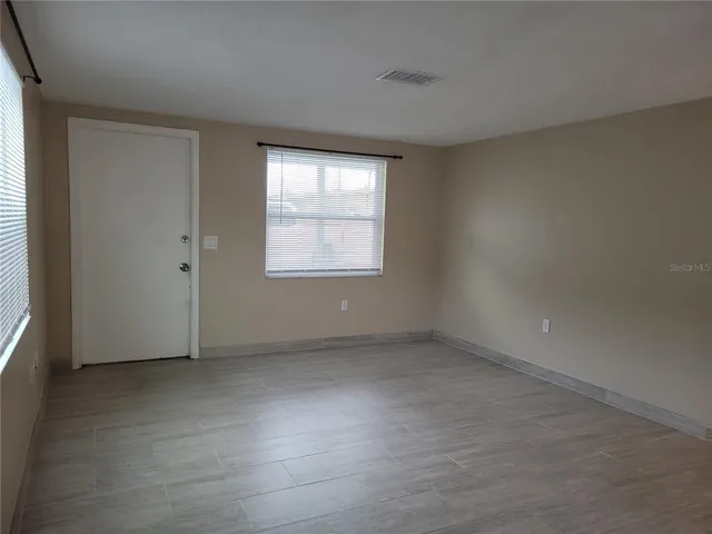 an empty room with a window