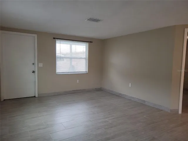 an empty room with a window