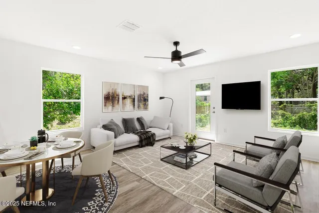 a view of a kitchen with a sink and a window