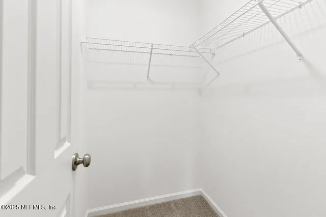 a view of small space with racks on the wall