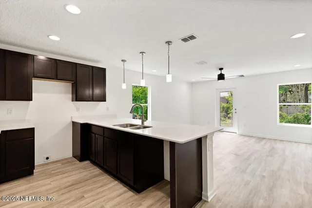 a view of an entryway with a livingroom