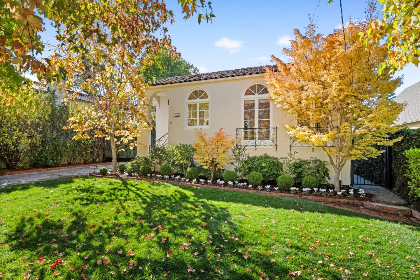a front view of a house with a yard
