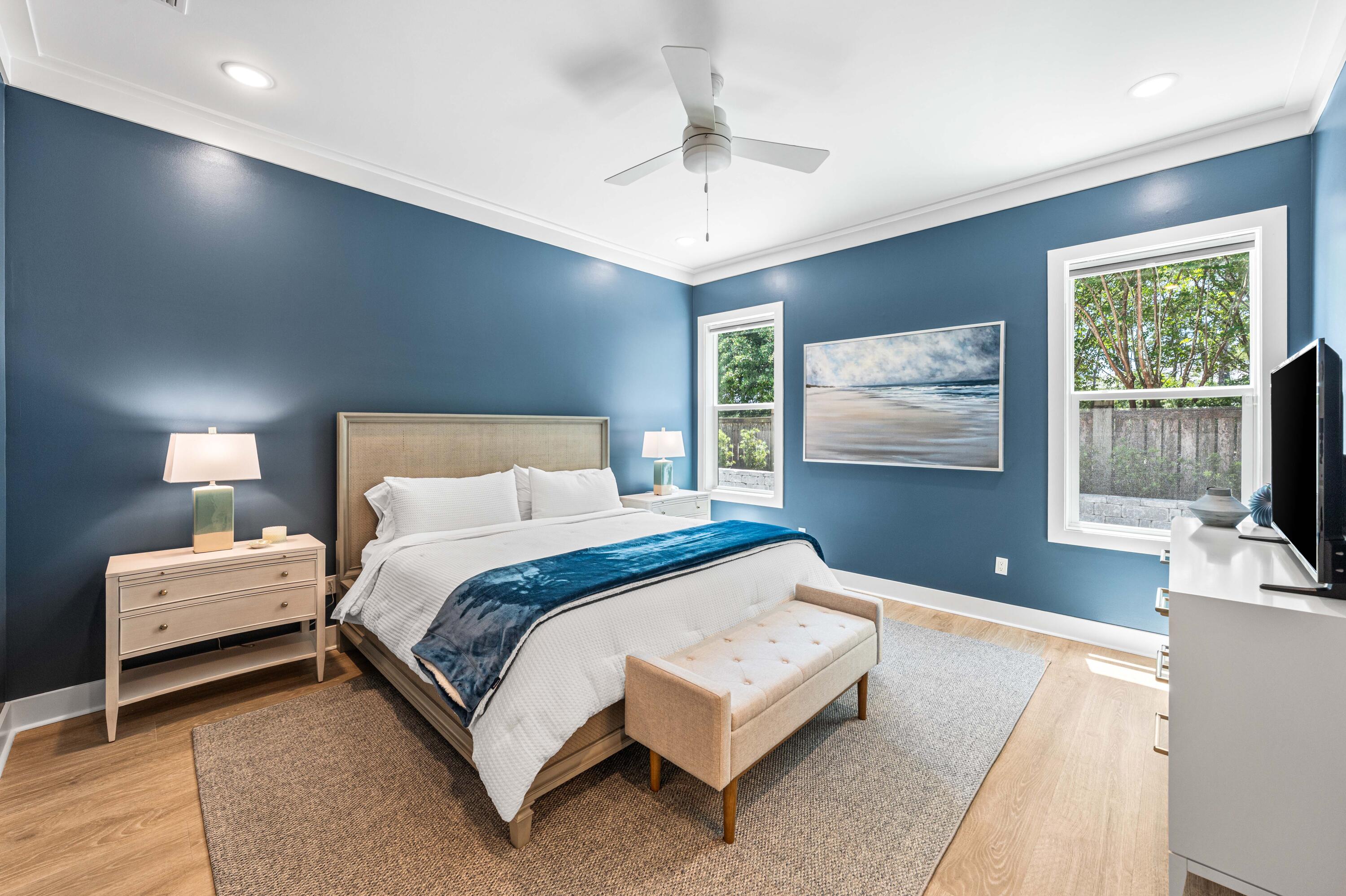 95 West Willow Mist Road Inlet Beach, FL 32461 - Photo 20 of 72 a bedroom with a large bed and a flat screen tv