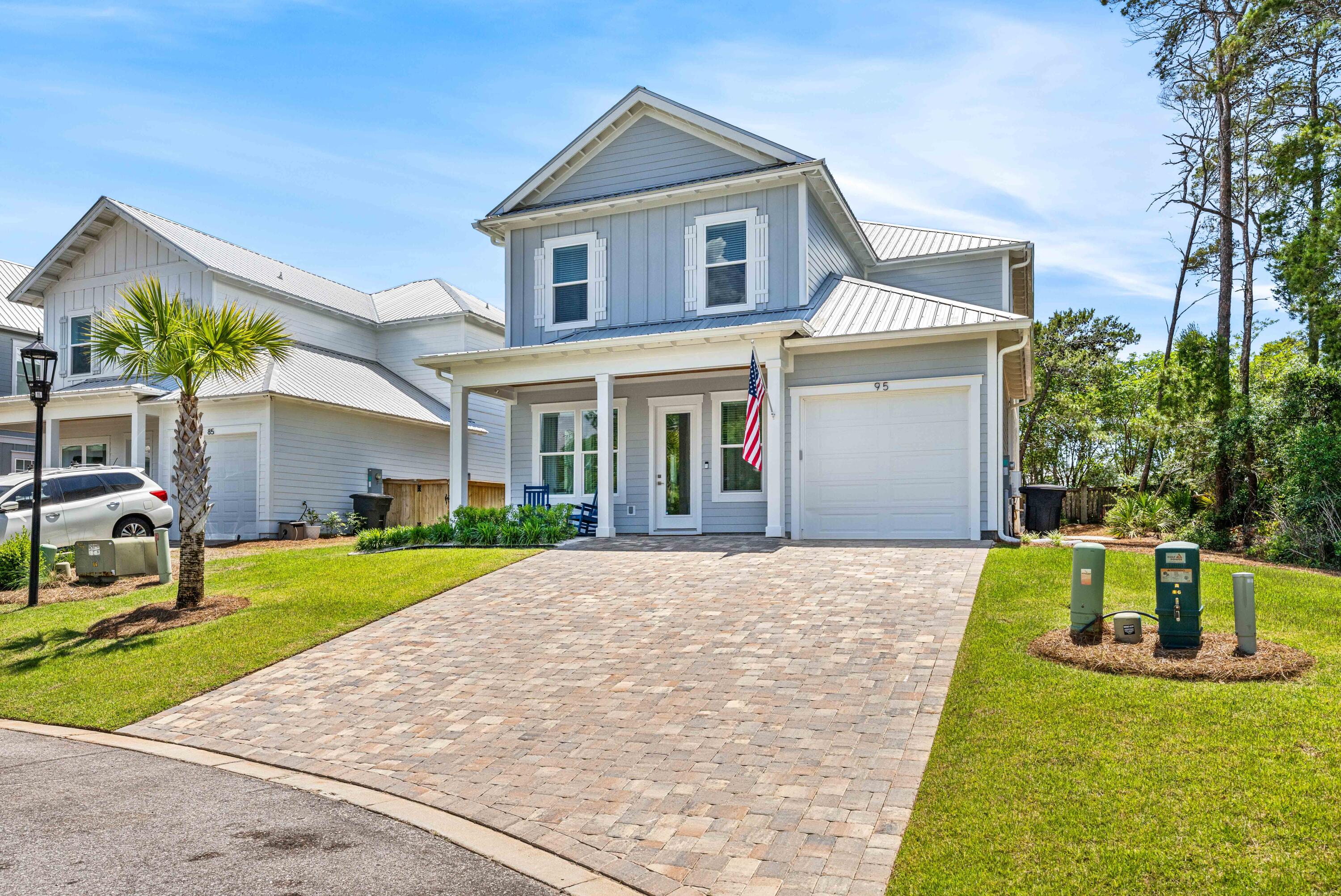 95 West Willow Mist Road Inlet Beach, FL 32461 - Photo 2 of 72 a front view of house with yard and green space
