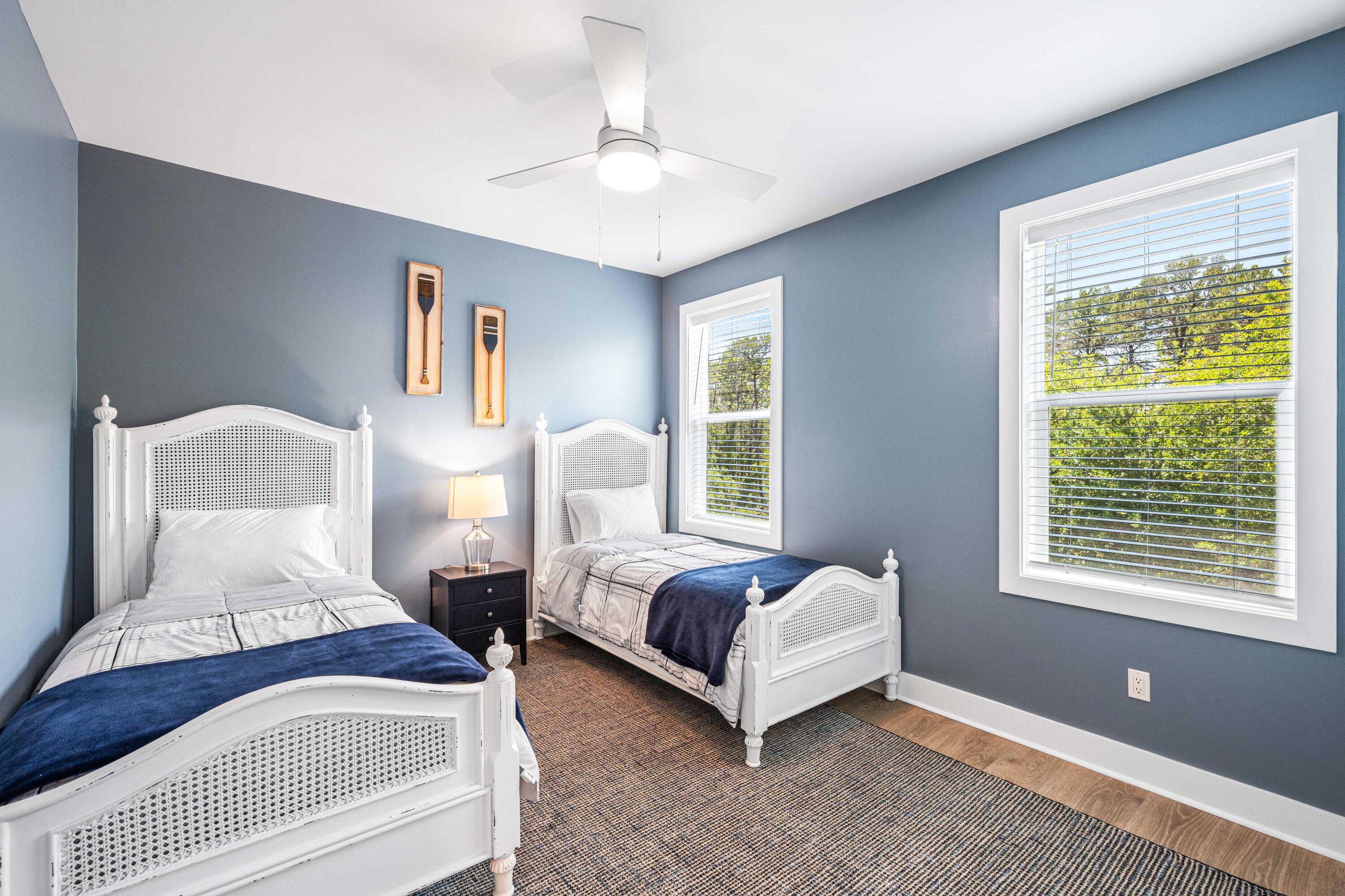 95 West Willow Mist Road Inlet Beach, FL 32461 - Photo 28 of 72 a bedroom with two beds and a window