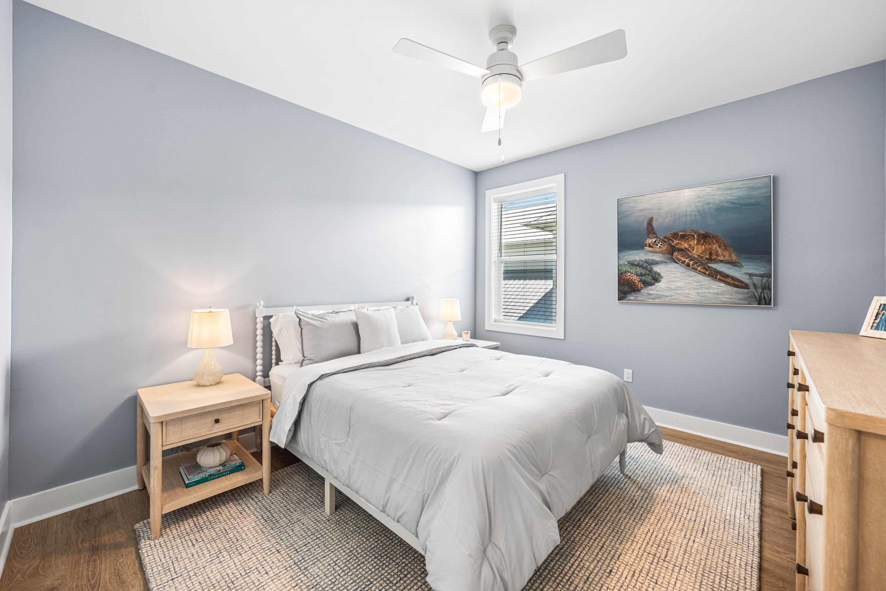 95 West Willow Mist Road Inlet Beach, FL 32461 - Photo 30 of 72 a bedroom with bed and a chandelier