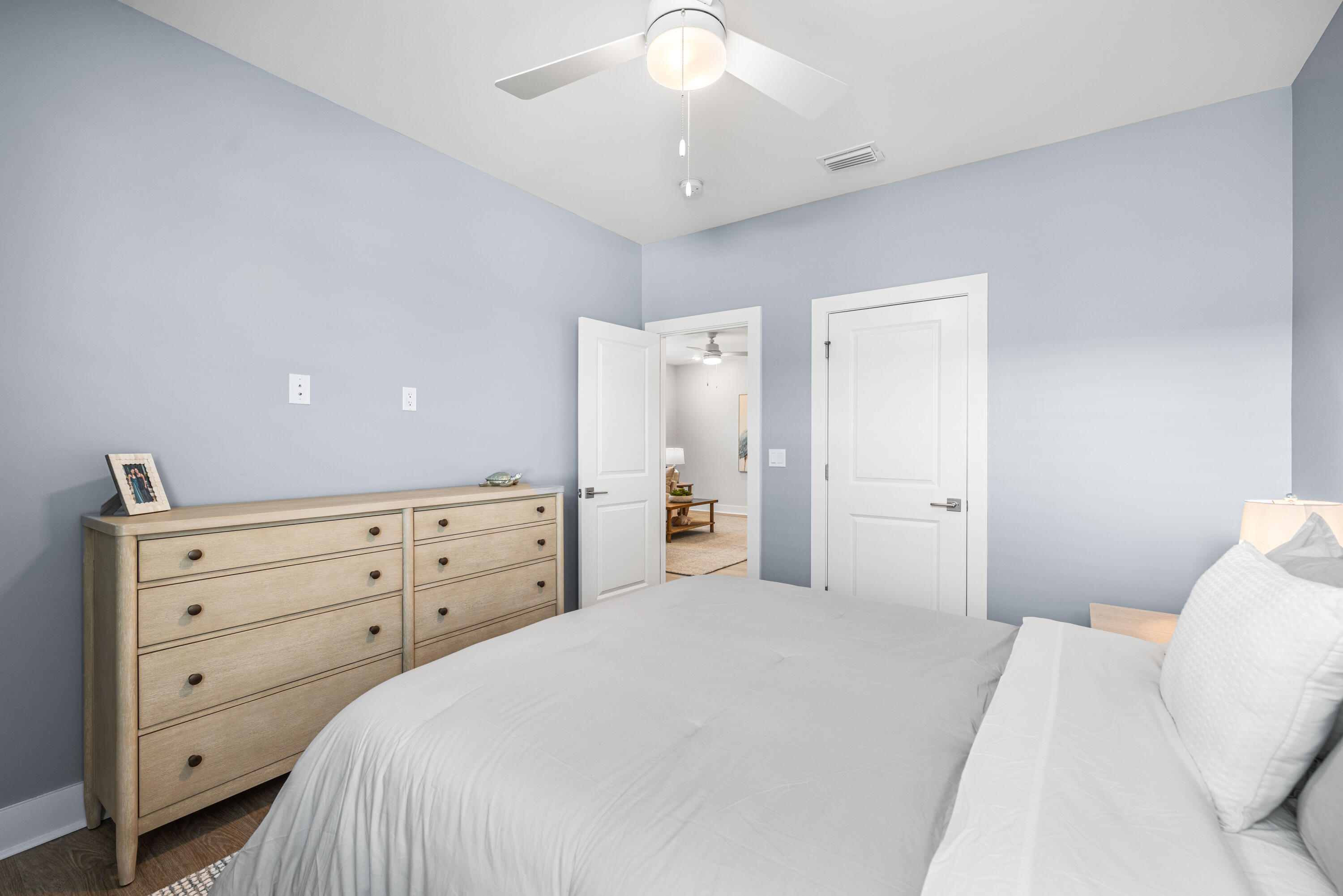 95 West Willow Mist Road Inlet Beach, FL 32461 - Photo 31 of 72 a bedroom with a bed and a dresser