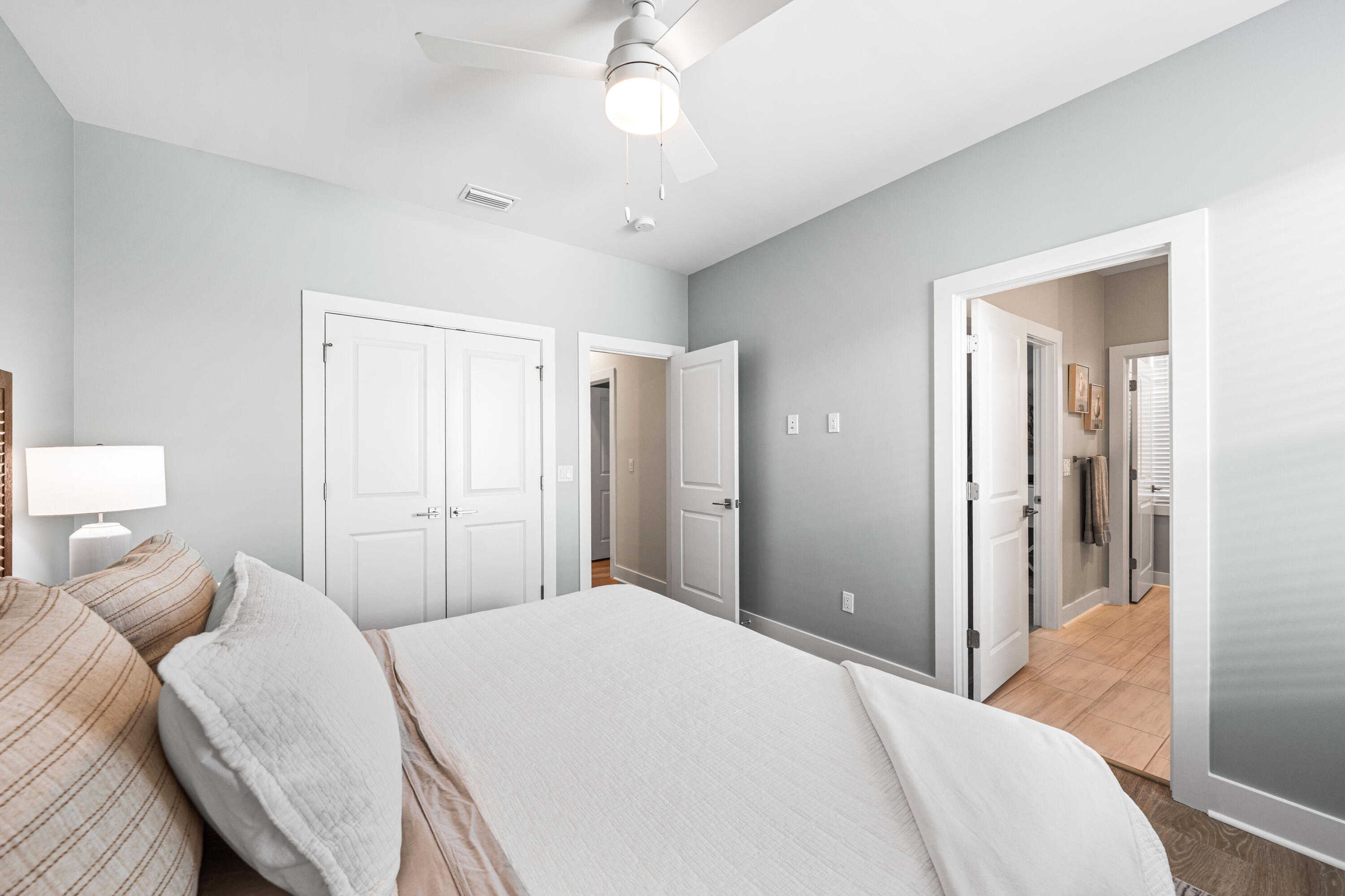 95 West Willow Mist Road Inlet Beach, FL 32461 - Photo 39 of 72 a bedroom with a bed and a chandelier