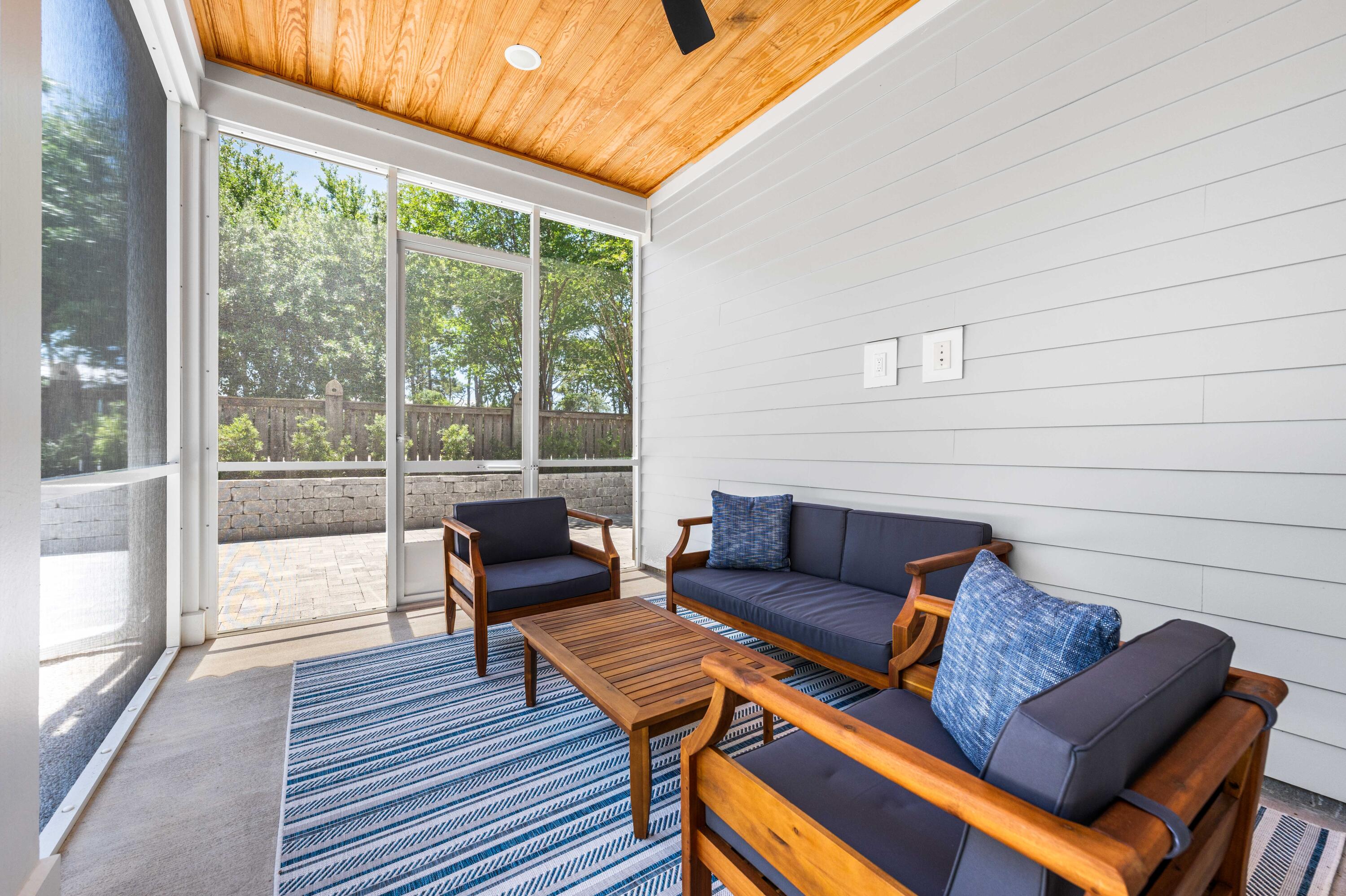 95 West Willow Mist Road Inlet Beach, FL 32461 - Photo 42 of 72 a living room with furniture and a large window