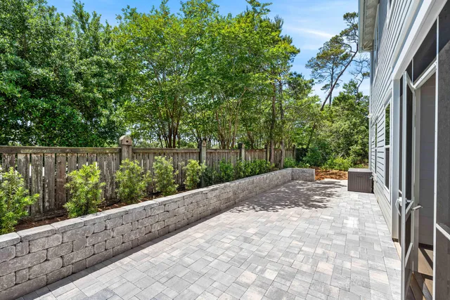 a view of a lake with houses in the back