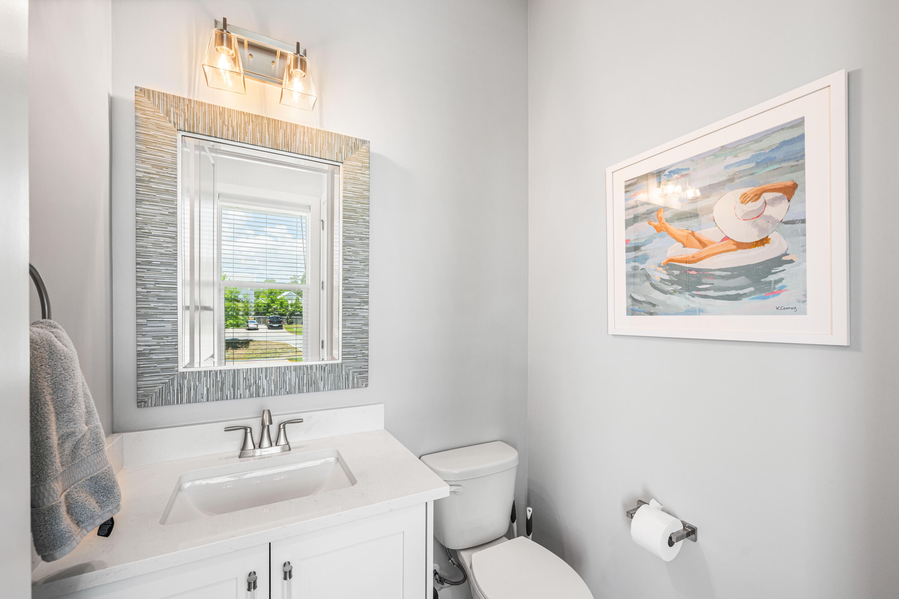 95 West Willow Mist Road Inlet Beach, FL 32461 - Photo 5 of 72 a bathroom with a toilet a sink and a mirror