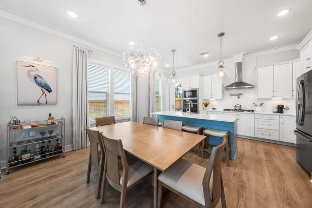 a view of kitchen with cabinets and wooden floor