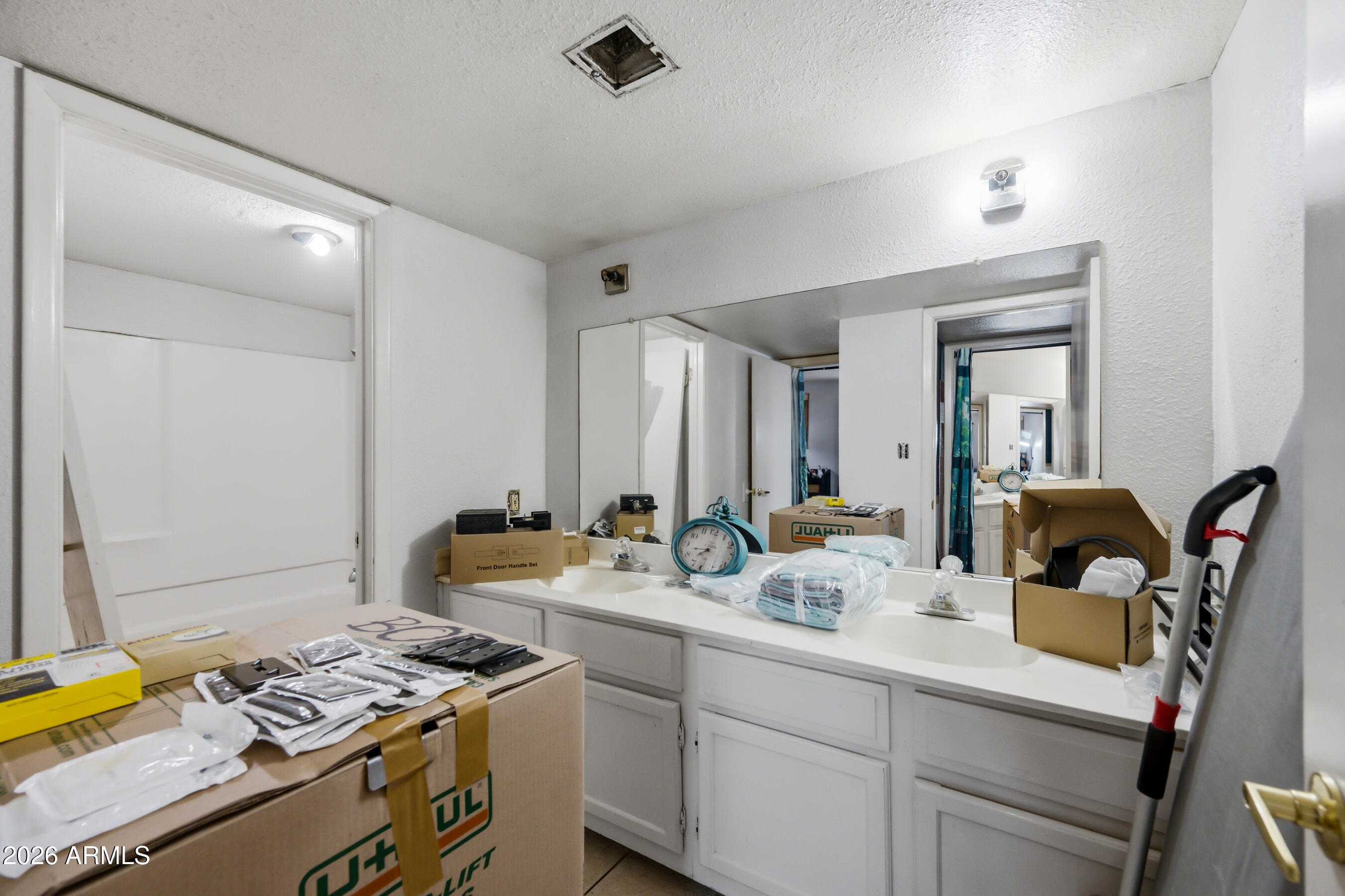 1051 South Dobson Road, Unit 187 Mesa, AZ 85202 - Photo 17 of 18 a room with storage and utility