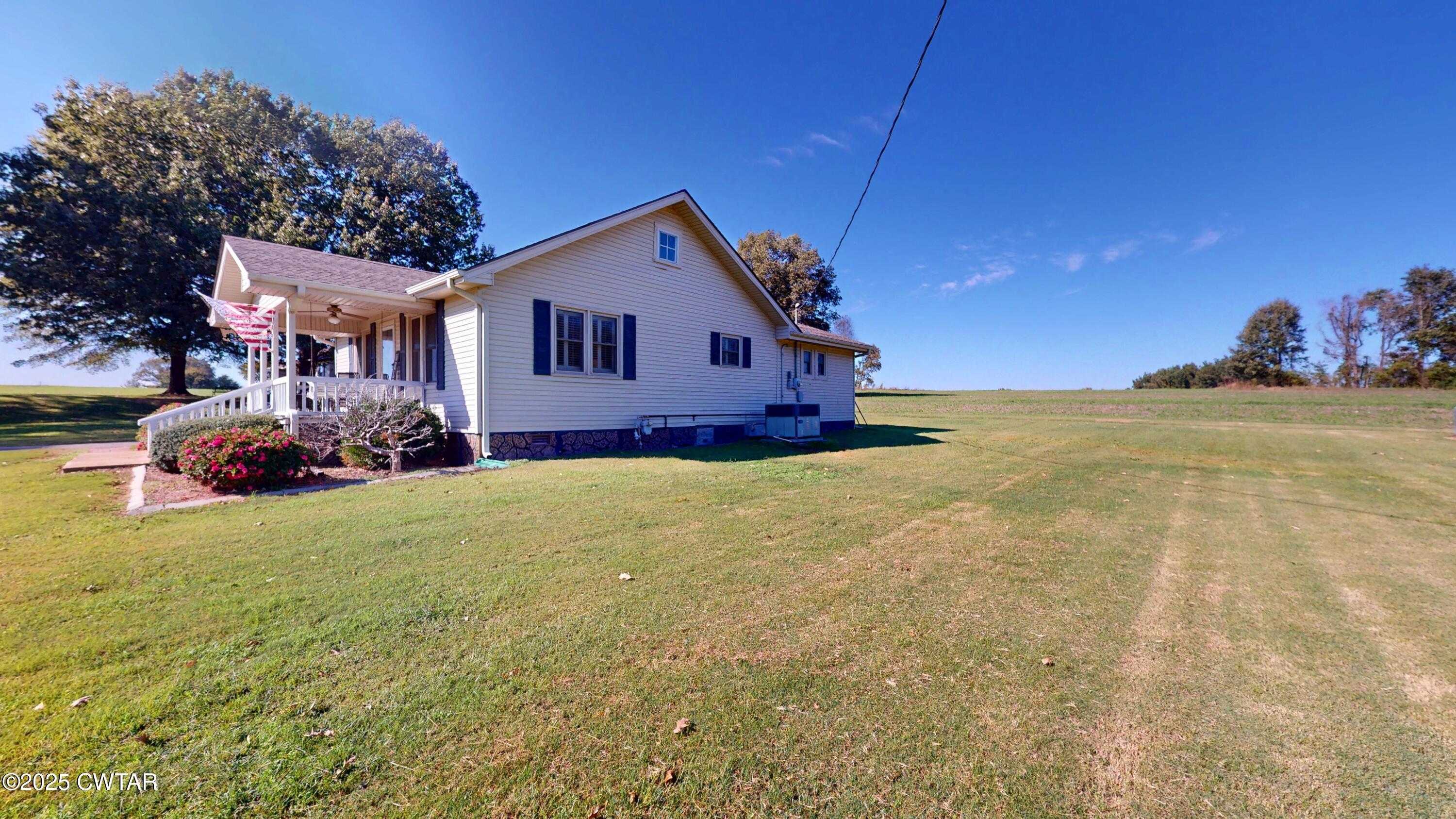 206 Tull Road Kenton, TN 38233 - Photo 3 of 34 a view of a house with a yard