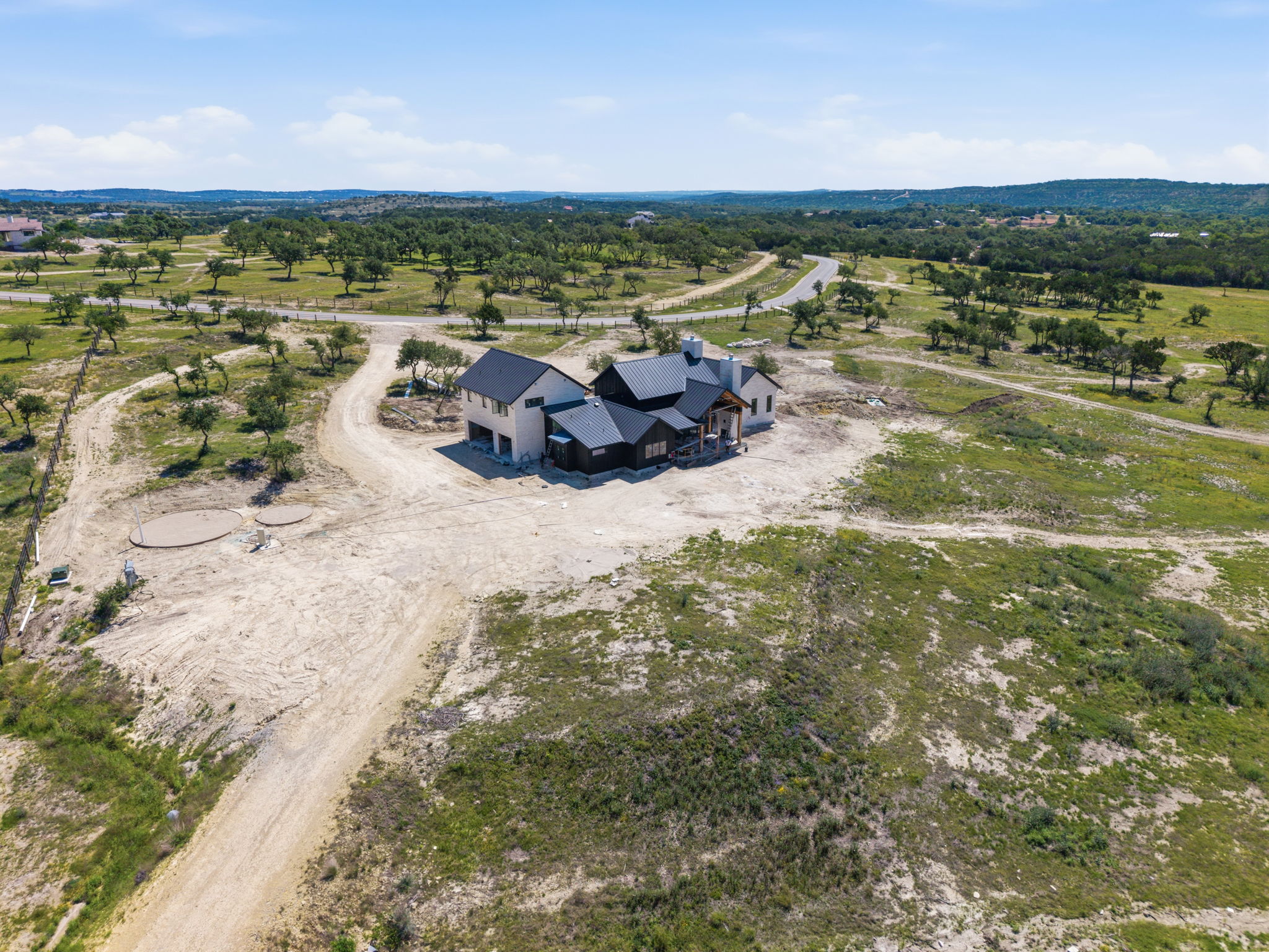 3300 Rm-165 Dripping Springs Dripping Springs, TX 78620 - Photo 3 of 25 a view of a lake with outdoor space