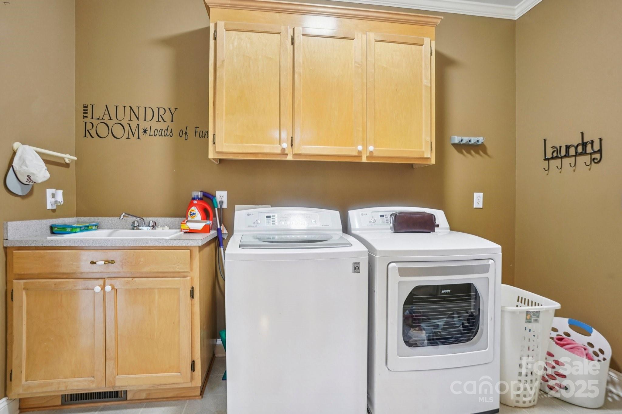 105 Berea Baptist Church Road Stanfield, NC 28163 - Photo 17 of 48 a utility room with dryer and washer
