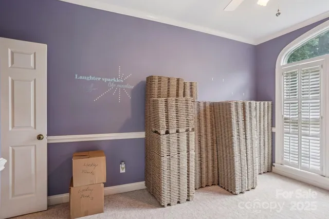 a view of entryway with a window and bathroom