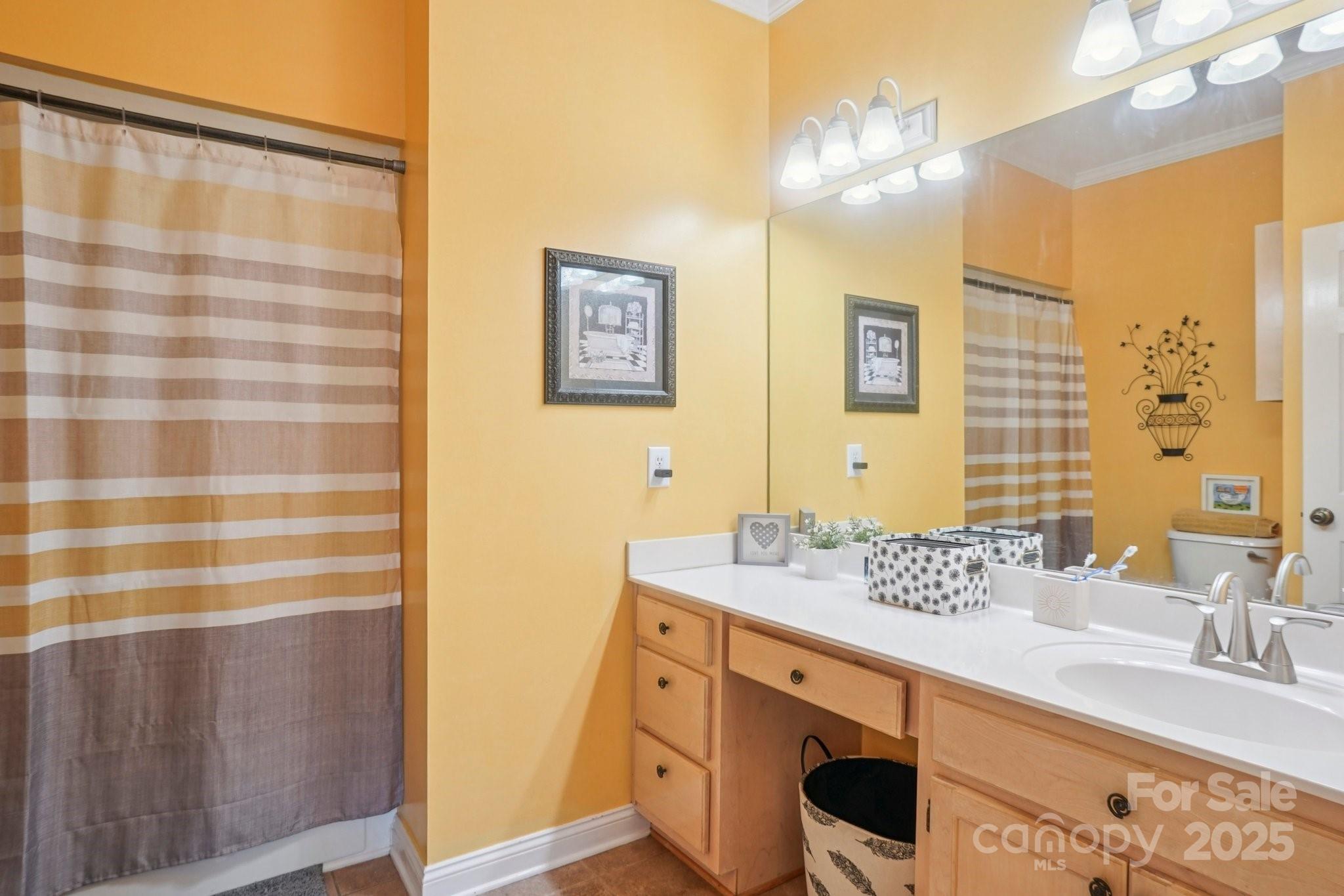 105 Berea Baptist Church Road Stanfield, NC 28163 - Photo 30 of 48 a spacious bathroom with a double vanity sink mirror and double
