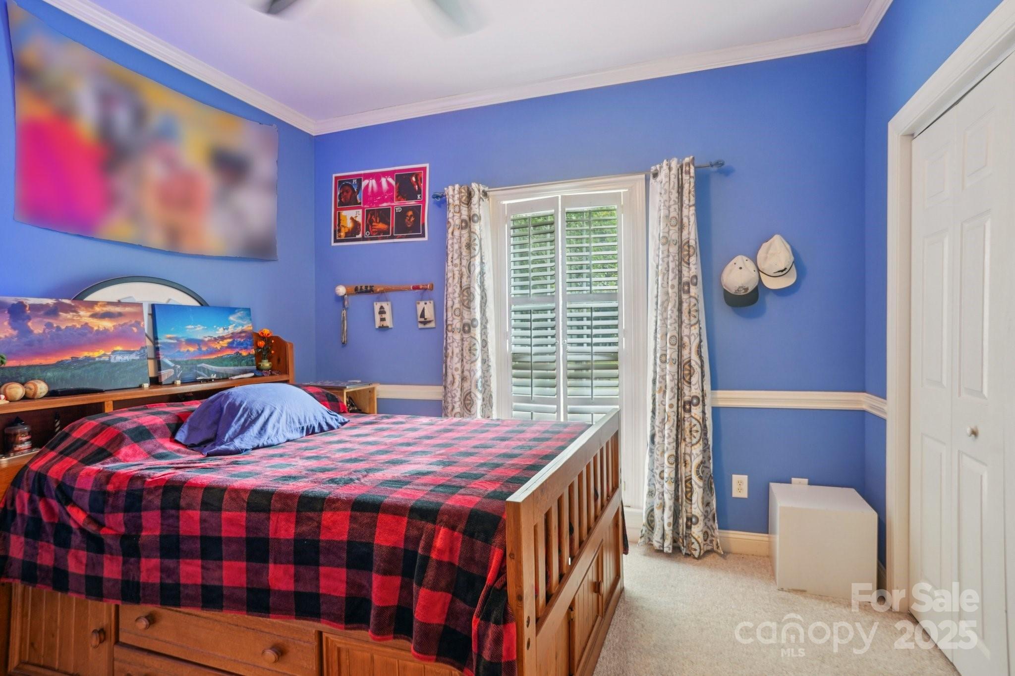 105 Berea Baptist Church Road Stanfield, NC 28163 - Photo 32 of 48 a bedroom with a bed and a table