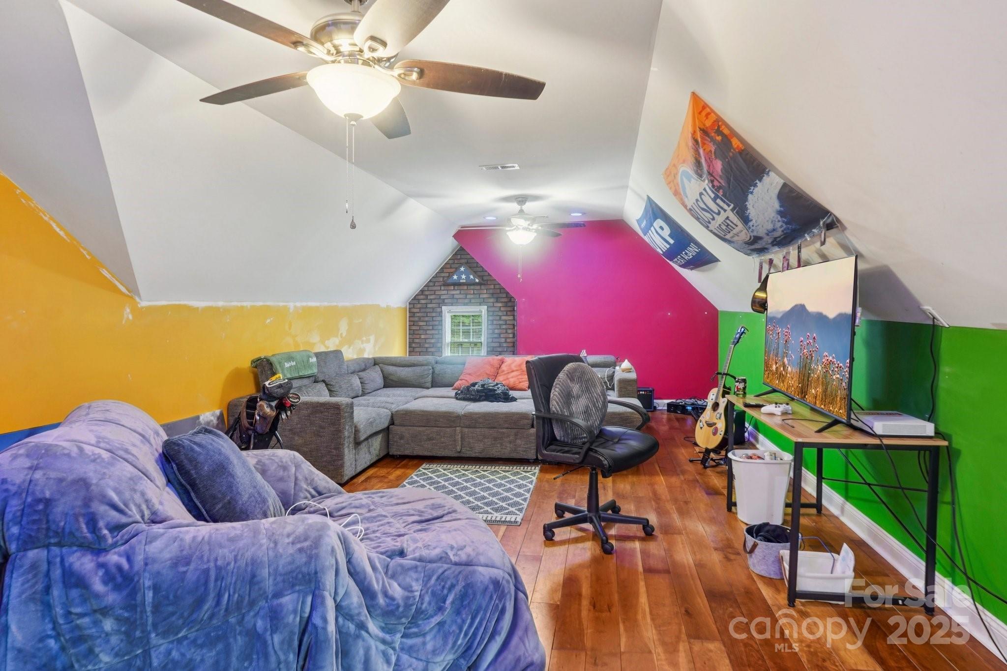 105 Berea Baptist Church Road Stanfield, NC 28163 - Photo 35 of 48 a living room with furniture and a chandelier
