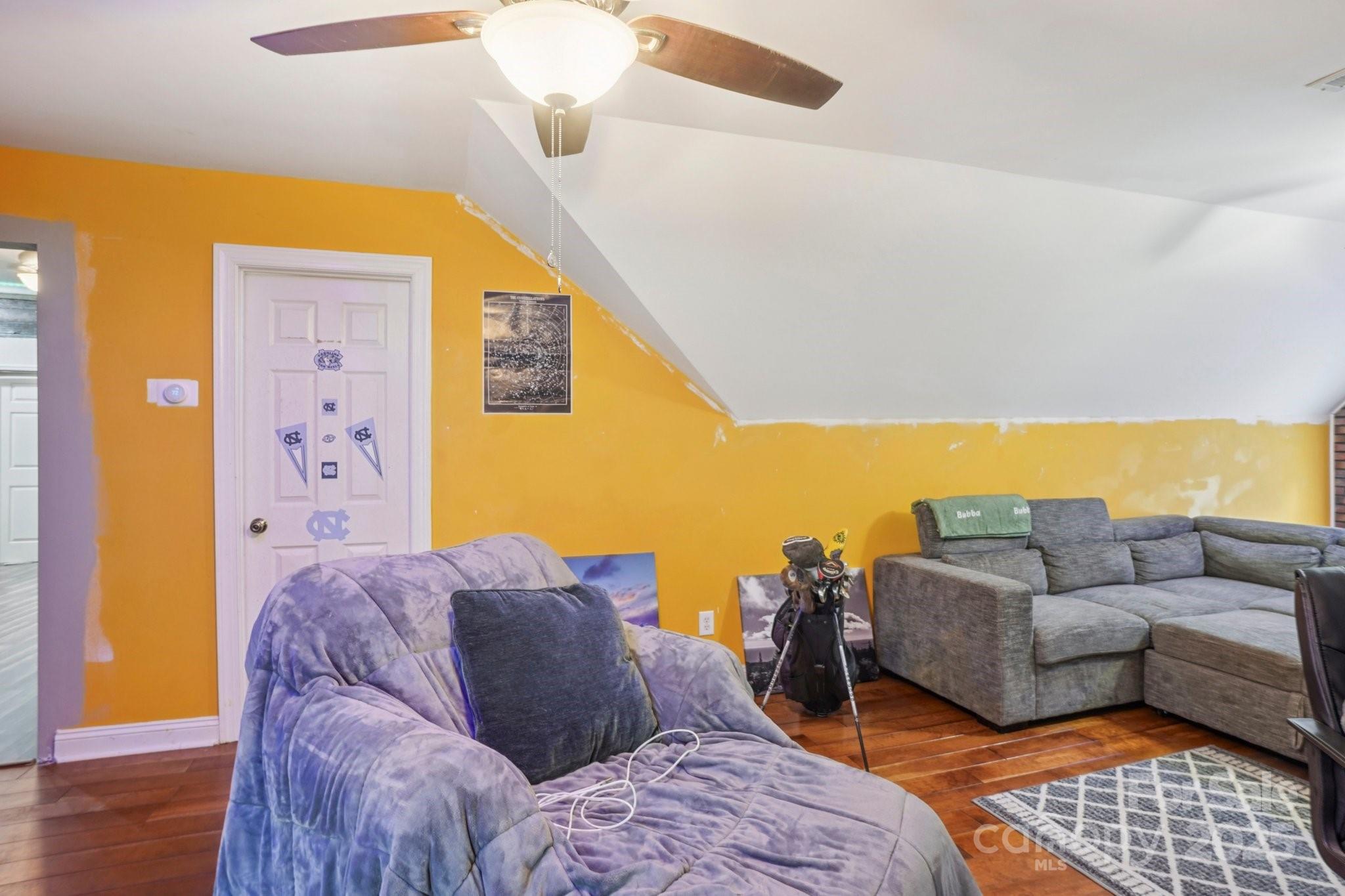 105 Berea Baptist Church Road Stanfield, NC 28163 - Photo 37 of 48 a living room with a couch and a dining table
