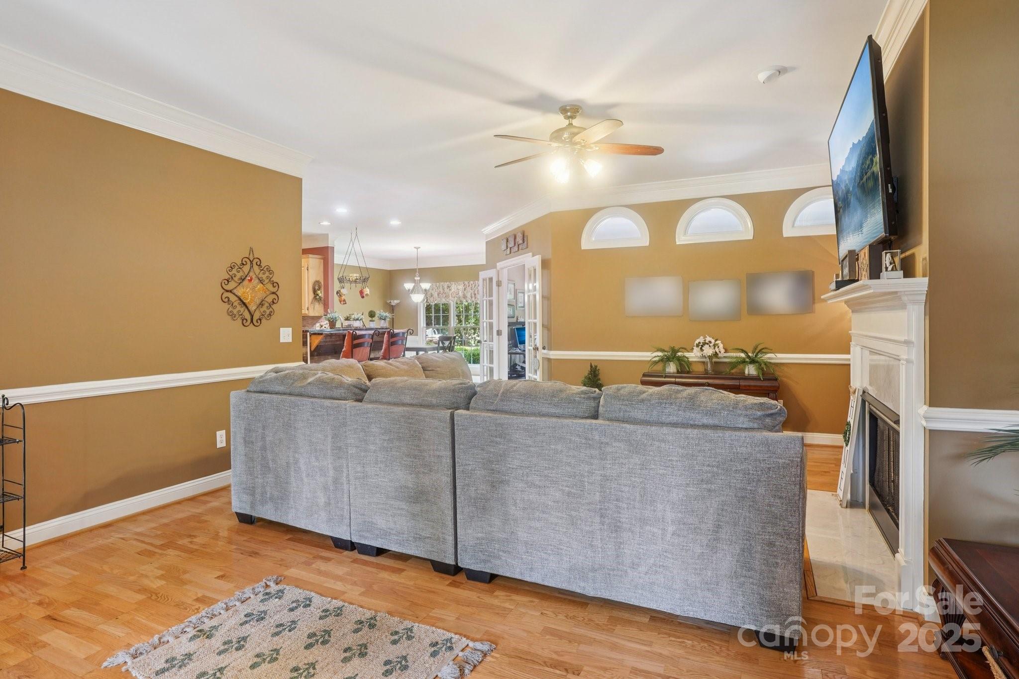 105 Berea Baptist Church Road Stanfield, NC 28163 - Photo 6 of 48 a living room with furniture and a large window