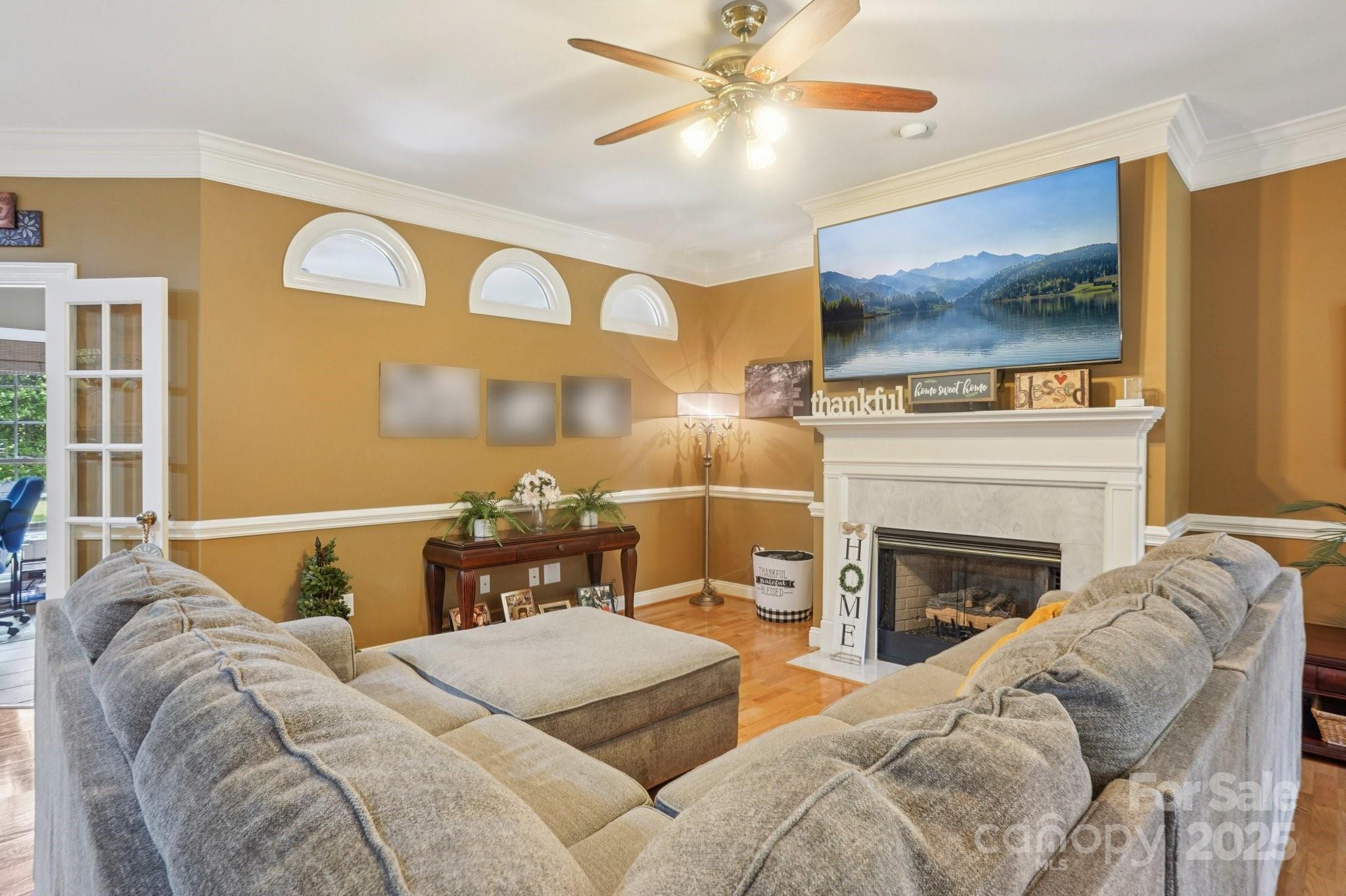105 Berea Baptist Church Road Stanfield, NC 28163 - Photo 7 of 48 a bed room with a bed and a fireplace