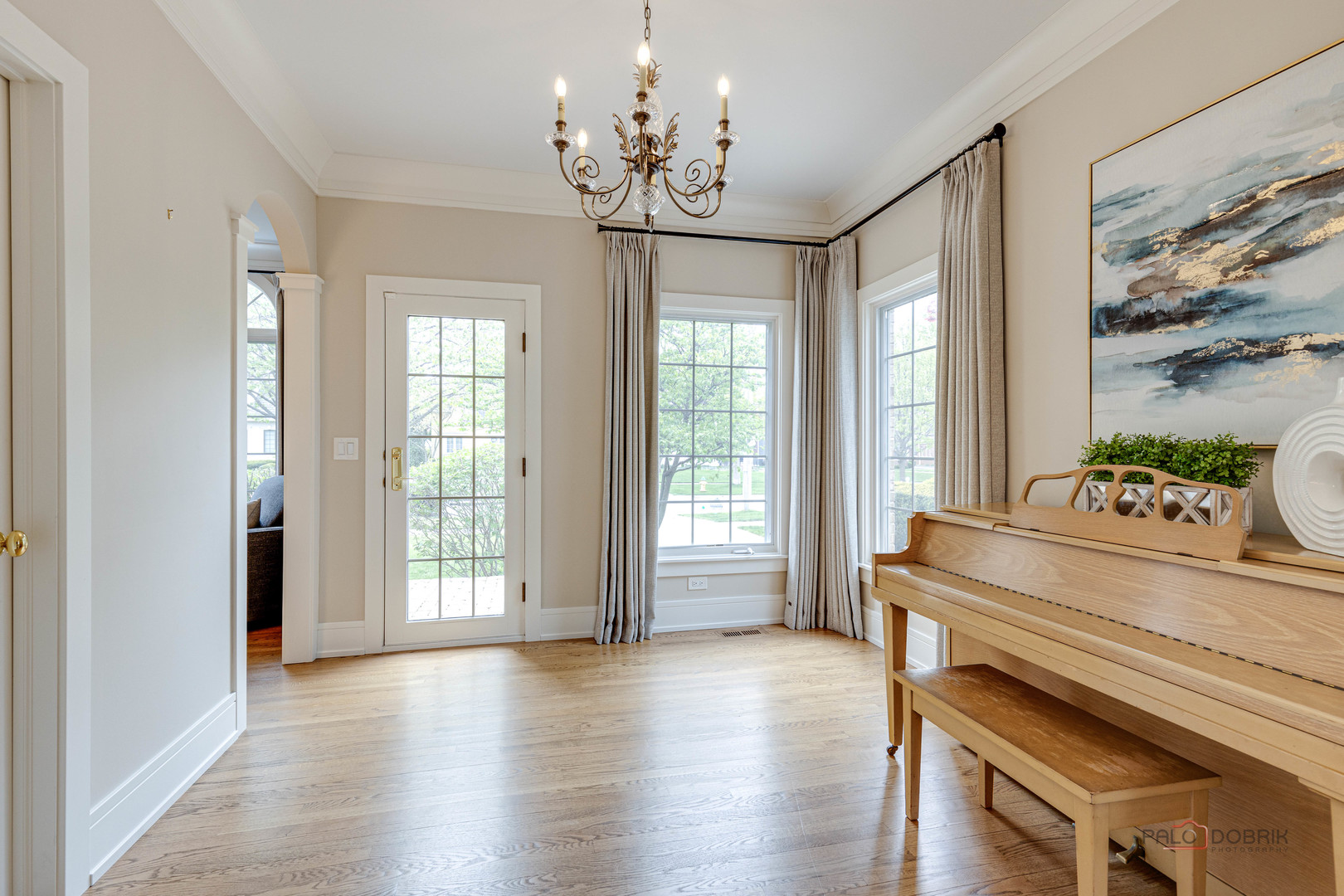 319 North County Line Road Hinsdale, IL 60521 - Photo 10 of 45 a spacious bedroom with a bed and wooden floor