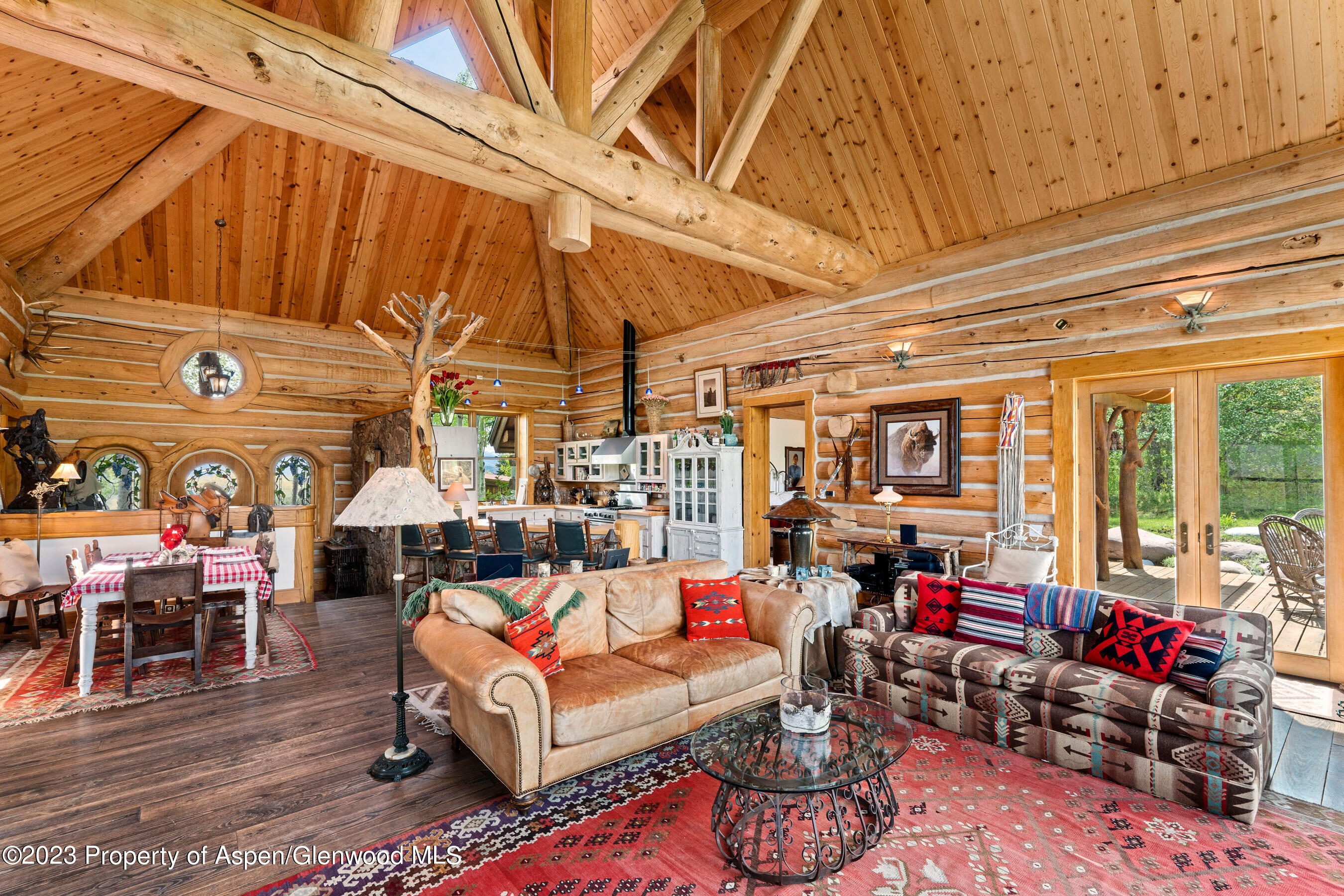 2088 Old Herron Road Basalt, CO 81621 - Photo 13 of 38 a living room with lots of furniture and a flat screen tv