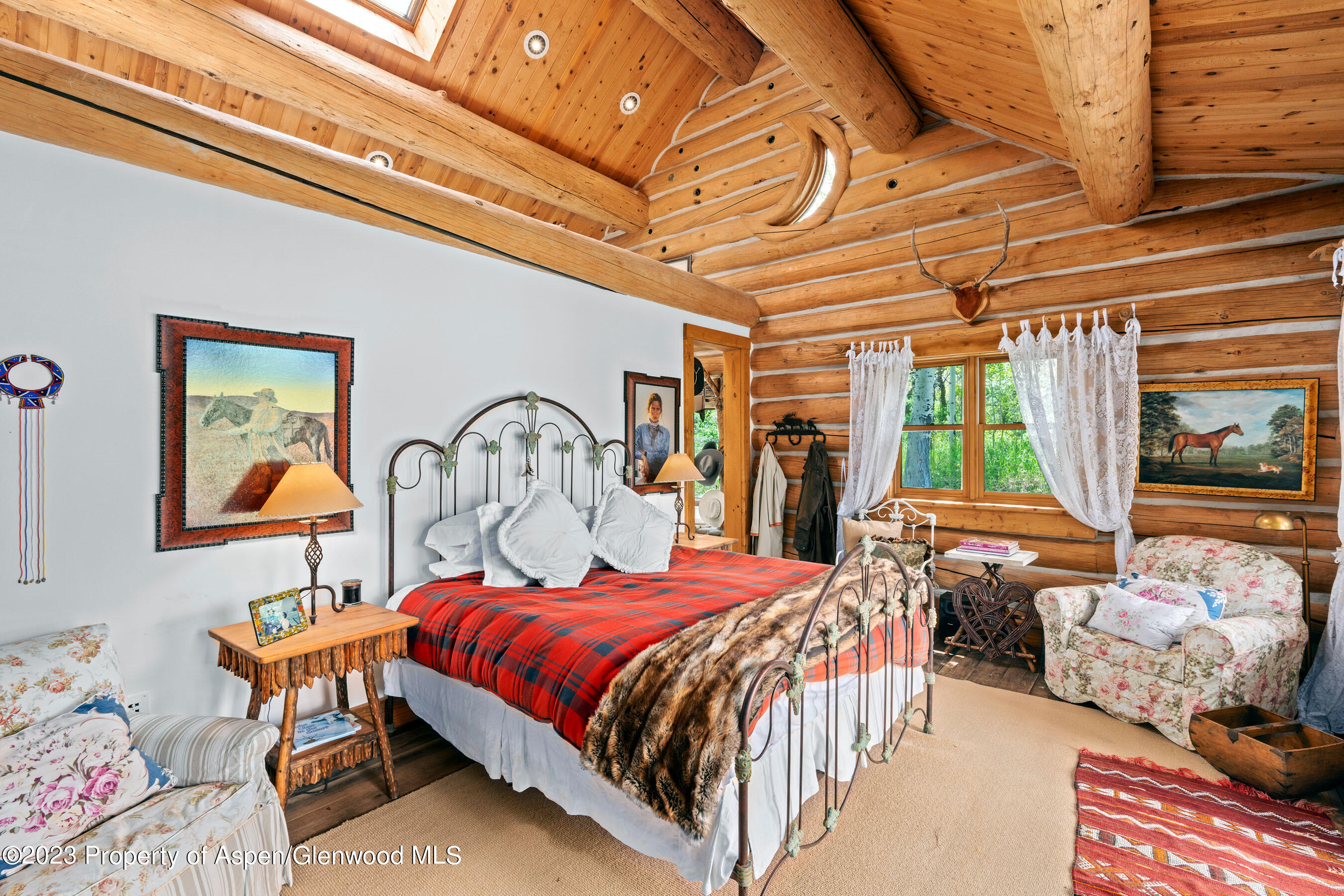 2088 Old Herron Road Basalt, CO 81621 - Photo 15 of 38 a bedroom with bed and wooden floor