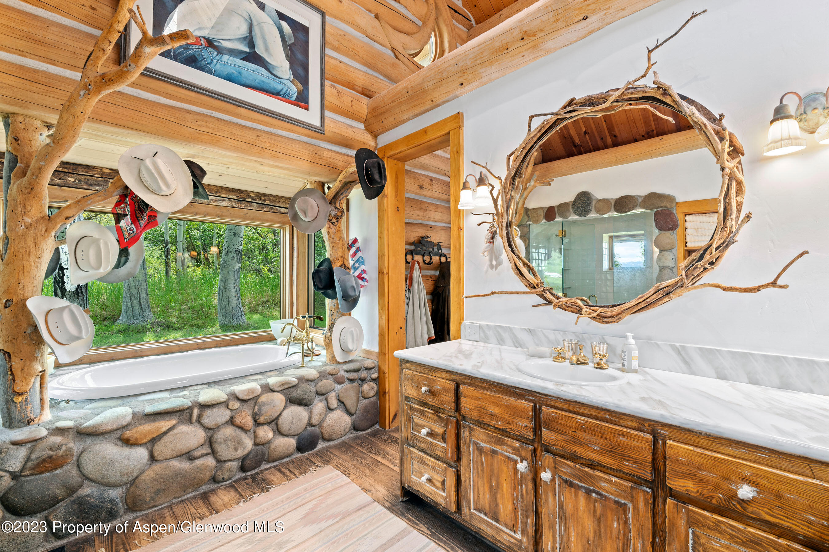 2088 Old Herron Road Basalt, CO 81621 - Photo 17 of 38 a bathroom with a sink mirror and vanity