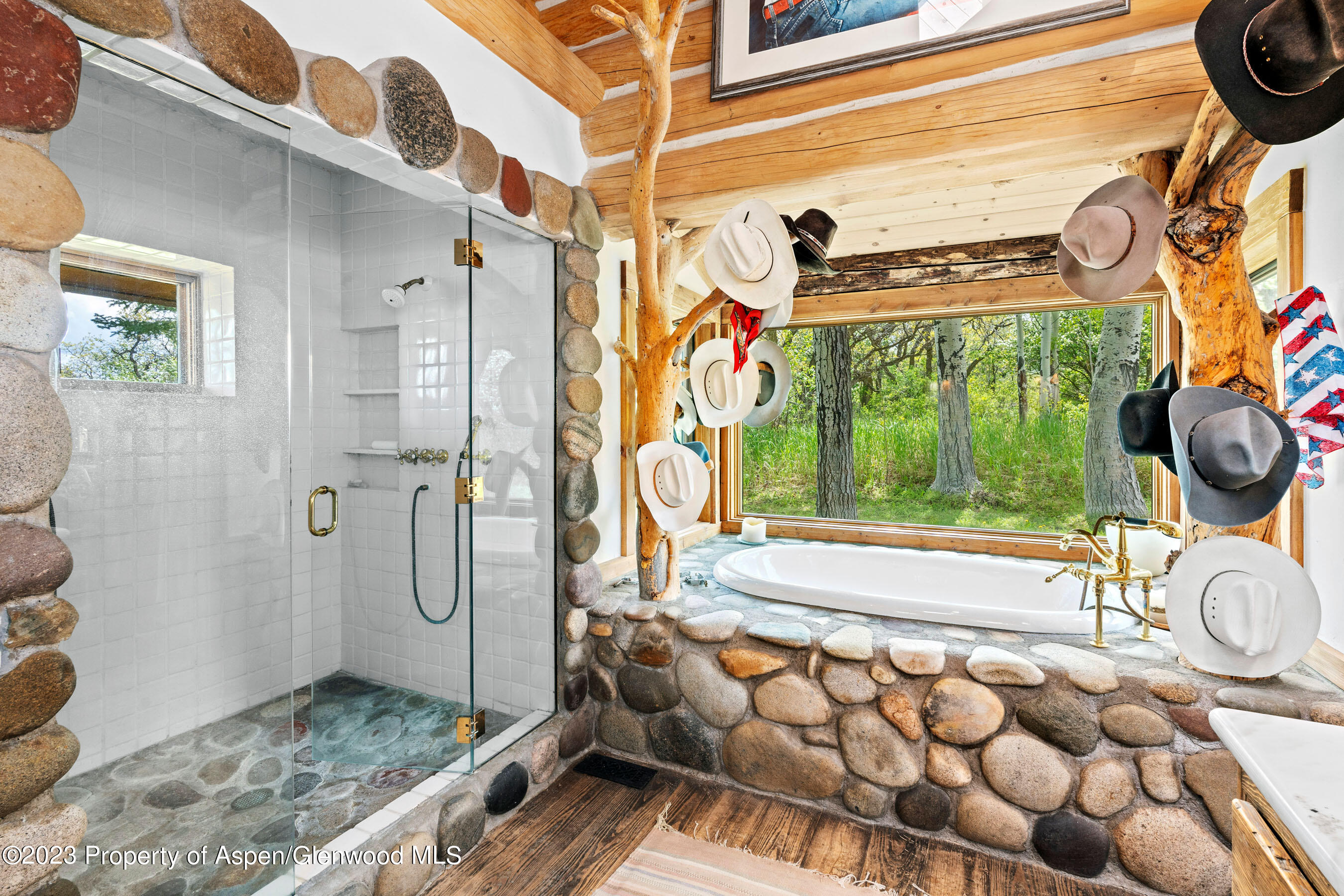 2088 Old Herron Road Basalt, CO 81621 - Photo 19 of 38 a bathroom with a granite countertop sink and a shower